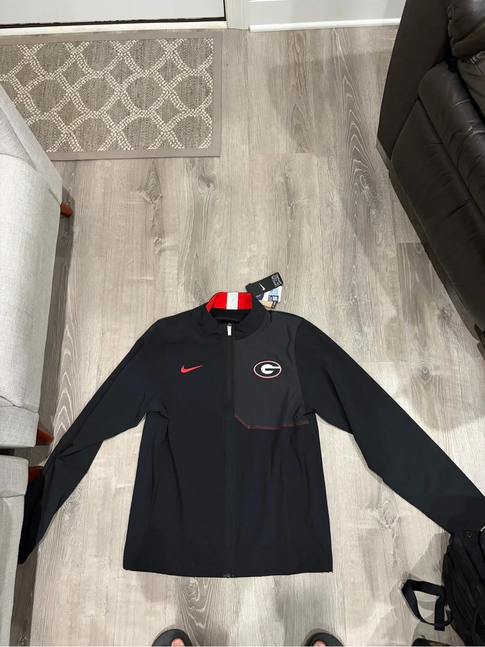 2026 Nike Black Georgia Bulldogs Lightweight Full-Zip Jacket with Red Accents